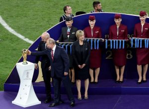 Russian president Vladimir Putin prepared to dish out the World Cup trophy