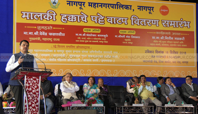 CM Fadnavis assured to provide land titles to two lakh slum dwellers