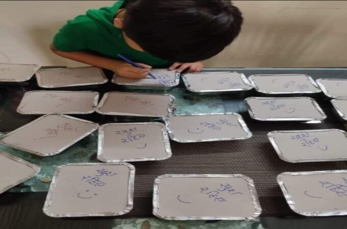 Boy's special message on meal boxes prepared by Mom for Covid-19 patients winning hearts on social media