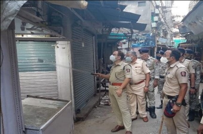 DCP leads foot patrolling in Mominpura, 10 establishments face action